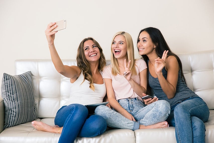 3 Girlfriends making selfie photo on smartphone. If you looked in the mirror recently and found that you’re unhappy about one aspect of your smile, don’t worry, you’re not alone. Here are the top 3 reason why you should consider cosmetic dentistry.