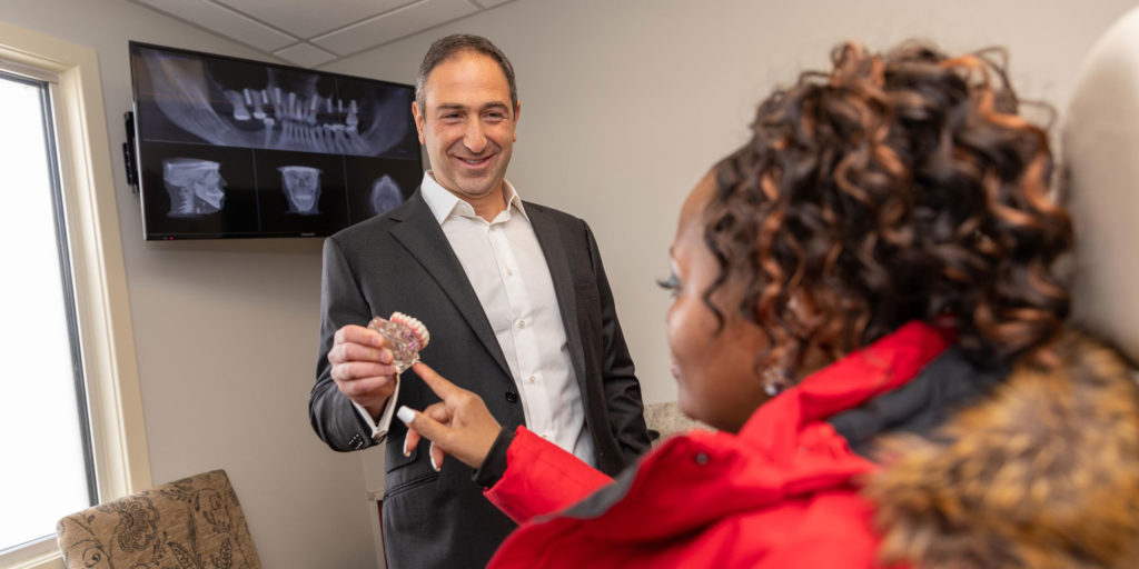 Dr. Sepiashvili Discussing Single Dental Implants With A Dental Patient