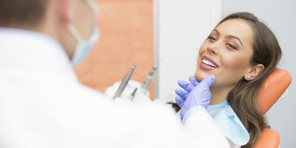 tooth extraction patient smiling