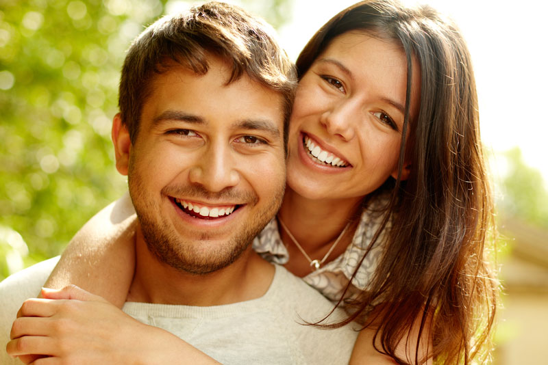 Dental Patients Smiling With Well Cared For Dental Implants In Mohegan Lake, NY