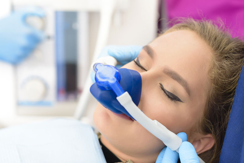 image of a patient receiving nitrous oxide sedation dentistry before a dental procedure