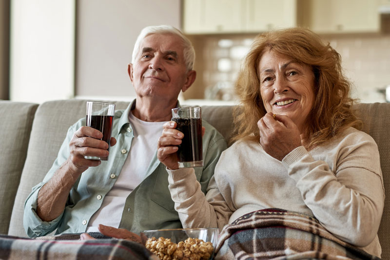 Dental Patients Eating And Drinking Using Their Implant Supported Dentures